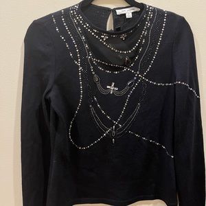 St John black top with fabulous silver and crystal top
Size P
NWT